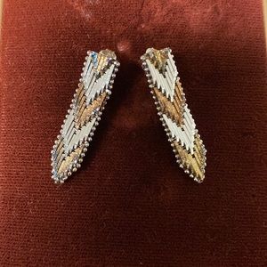 Tried-color (silver, gold and bronze) 925 sterling silver pierced earrings.